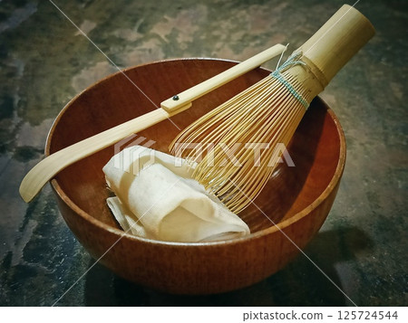 Matcha Bowl with Bamboo Whisk and Scoop. Green tea brewing equipment. Matcha Bowl with Bamboo Whisk and Scoop. Green tea brewing equipment. 125724544