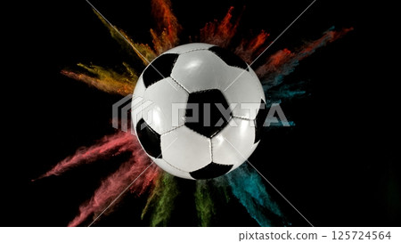 Soccer ball with coloured powder explosion. 125724564