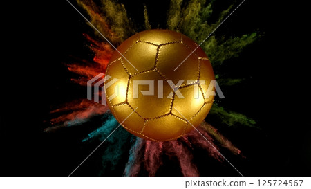 Soccer golden ball with coloured powder explosion. Soccer golden ball with coloured powder explosion. 125724567