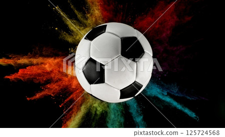 Soccer ball with coloured powder explosion. 125724568