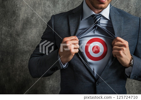 Businessman with a target symbol on his chest 125724710