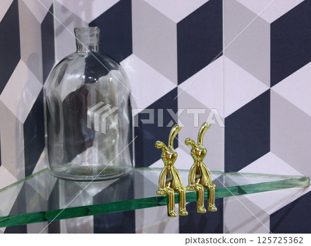 Elegant Glass Bottle with Golden Rabbit Figurines perfect for enhancing any setting Elegant Glass Bottle with Golden Rabbit Figurines perfect for enhancing any setting 125725362