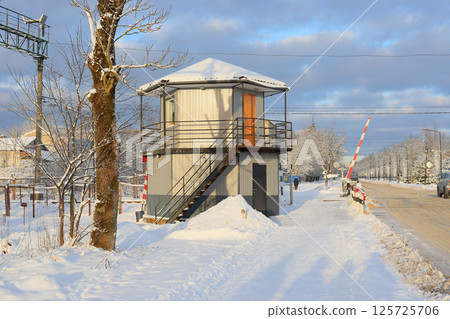 A Beautiful Snowy Scene Featuring a Watchtower Standing Tall in a Serene Winter Landscape A Beautiful Snowy Scene Featuring a Watchtower Standing Tall in a Serene Winter Landscape 125725706