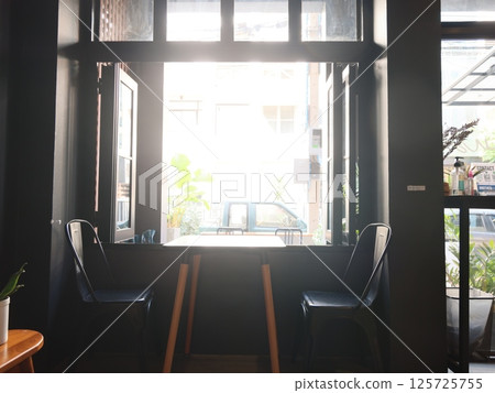 Cozy Caf Interior with Natural Light and Minimalist Design 125725755