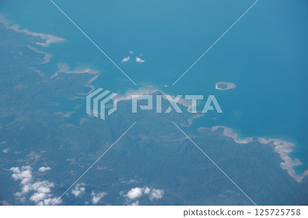 Breathtaking Aerial View of the Beautiful Coastal Landscape and Surrounding Islands Breathtaking Aerial View of the Beautiful Coastal Landscape and Surrounding Islands 125725758