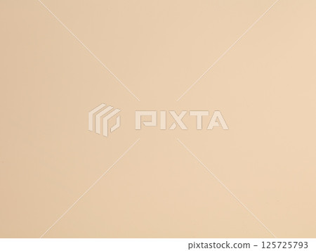 A neutral beige background perfect for creating versatile designs across various mediums 125725793