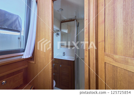 Explore the Stylish Yacht Interior with a Modern Bathroom Design Combining Comfort and Luxury 125725854
