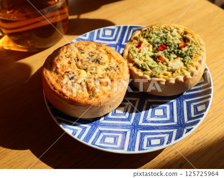 Delicious and Savory Pies Presented on a Beautifully Decorative Plate for Any Occasion 125725964