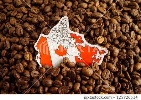 Canada flag on coffee beans, shopping online for export or import food product. 125726514
