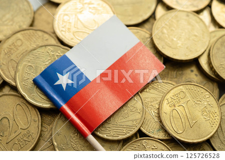 Chili flag on coins background, finance and accounting, banking concept. 125726528