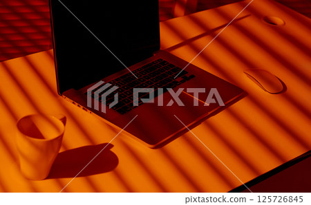 Creative Office Setup with Laptop, Mug and Mouse in Sunset Light. 125726845