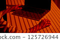 Shadows and Hands Using Laptop with External Mouse. 125726944