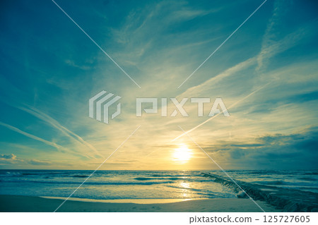 Seascape in the evening. Seacoast of Costa da Caparica city at sunset. Almada, Portugal 125727605
