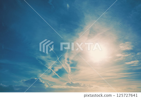 Blue cloudy sky at sunset. Gradient color. Sky texture. Abstract nature background Blue cloudy sky at sunset. Gradient color. Sky texture. Abstract nature background 125727641