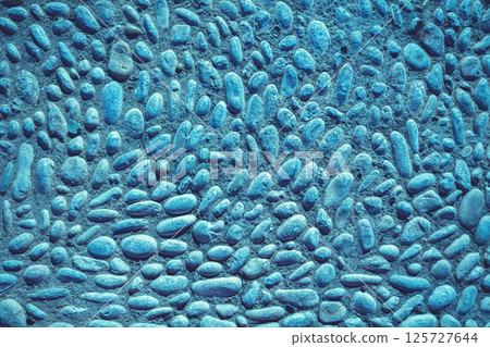 Abstract pebbles background. Blue pebbles texture. Stone background. Blue vintage color. Sea pebbles on concrete. Turquoise color Abstract pebbles background. Blue pebbles texture. Stone background. Blue vintage color. Sea pebbles on concrete. Turquoise color 125727644