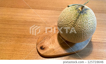 Yubari melon on the table Yubari melon on the table 125728646