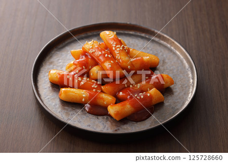 Spicy and delicious Korean tteokbokki served on a plate Spicy and delicious Korean tteokbokki served on a plate 125728660