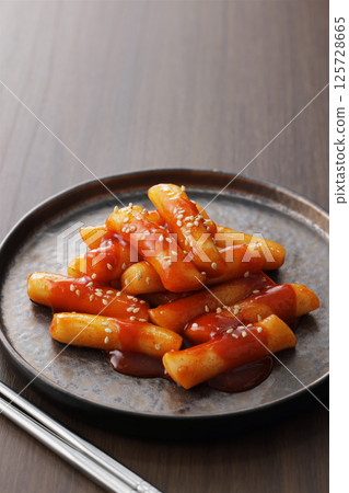 Spicy and delicious Korean tteokbokki served on a plate Spicy and delicious Korean tteokbokki served on a plate 125728665