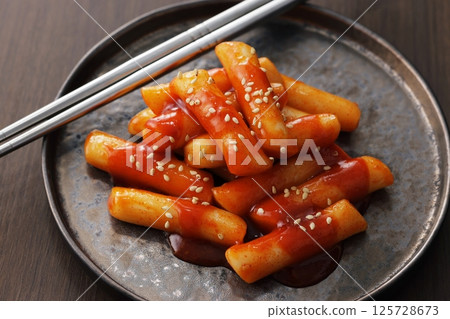 Spicy and delicious Korean tteokbokki served on a plate Spicy and delicious Korean tteokbokki served on a plate 125728673