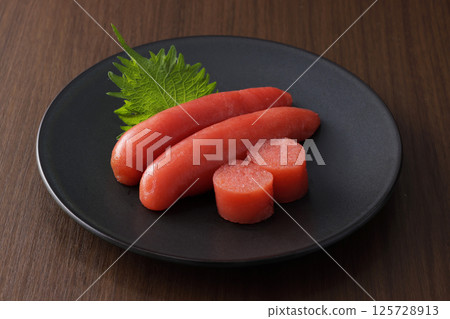 Delicious-looking mentaiko served on a plate Delicious-looking mentaiko served on a plate 125728913