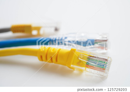 Ethernet cable for connect to wireless router link to internet service provider network. Ethernet cable for connect to wireless router link to internet service provider network. 125729203