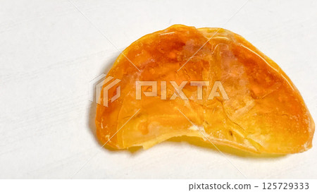 Colourful orange dried fruit 125729333