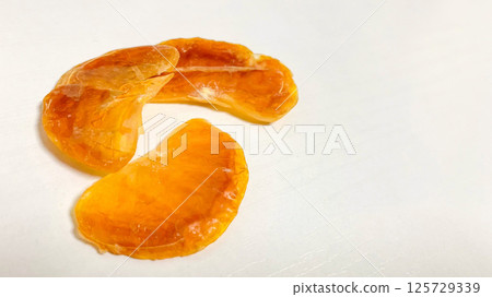 Colourful orange dried fruit Colourful orange dried fruit 125729339