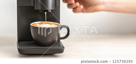 Modern coffee machine brewing cup of latte with intricate foam art, showcasing high precision and elegance on wooden countertop 125730193