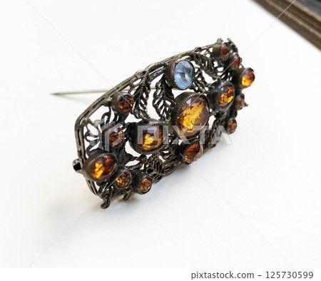 Jewelry brooch womens vintage style detail on background 125730599