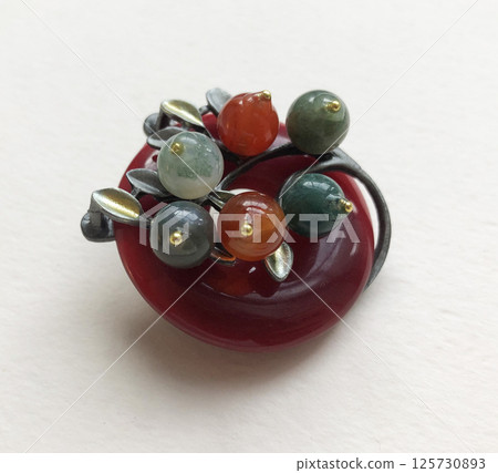 Retro jewelry brooch for women fashion closeup flat lay 125730893