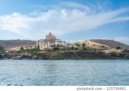 Nile River View with Historic Monastery Near Aswan Dam. 125730981