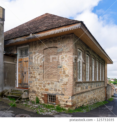 Historic Stone Building With Wooden Roof and Large Windows in a Quiet Rural Area 125731035
