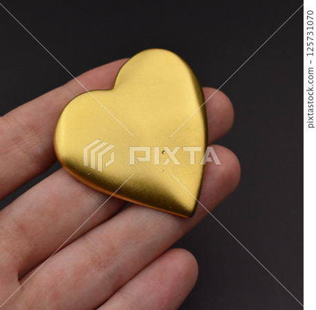 Brooch laid flat on pastel background vintage womens style 125731070