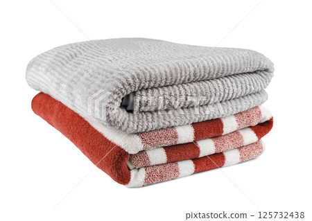 Soft fluffy striped grey and red bath towels folded in stack isolated on white background Soft fluffy striped grey and red bath towels folded in stack isolated on white background 125732438