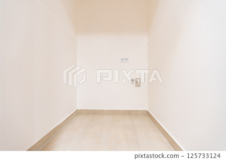 Utility corner in modern apartment prepared for washing machine installation 125733124