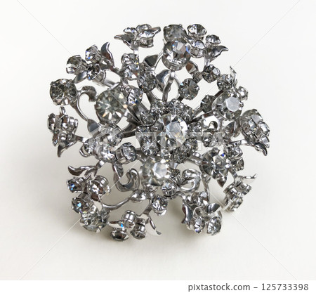 Vintage brooch womens handmade accessory closeup 125733398