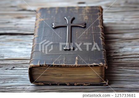 On wooden table, Christian Holy book Bible with cross on cover AI Generative 125733681