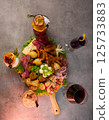 Overhead View of Appetizer Board and Cocktails 125733883