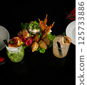Elegant Appetizer Platter with Two Cocktails 125733886