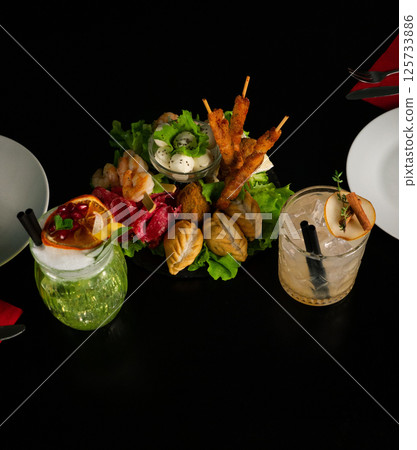 Elegant Appetizer Platter with Two Cocktails Elegant Appetizer Platter with Two Cocktails 125733886