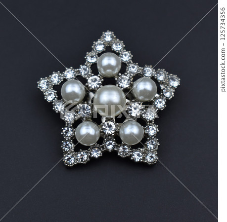 Brooch laid flat vintage floral design womens accessory Brooch laid flat vintage floral design womens accessory 125734356
