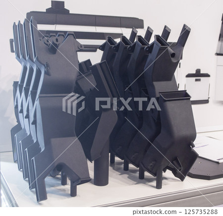 Model printed on 3D printer from polyamide powder close-up. Detailed prototype created on 3D printer from plastic powder. 3D printing additive powder technology, Multi Jet Fusion MJF technology 125735288