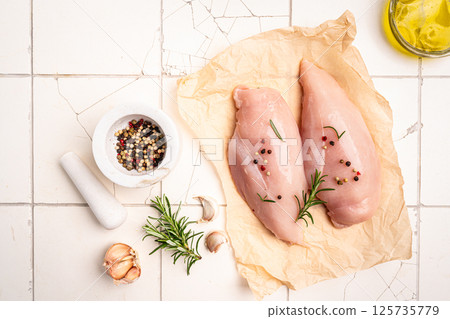 Raw chicken fillet or breasts 125735779