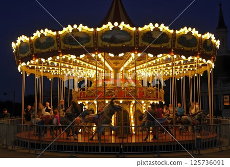 Night Magic at the Vintage Carousel with Twinkling Lights Night Magic at the Vintage Carousel with Twinkling Lights 125736091