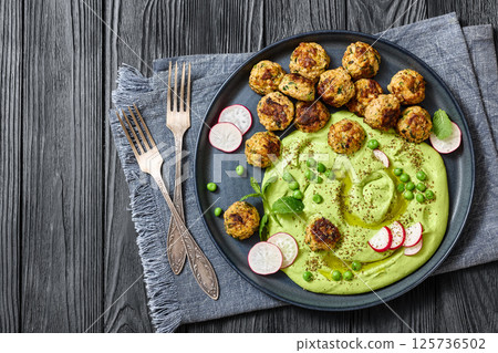 chicken broccoli meatballs with green pea hummus chicken broccoli meatballs with green pea hummus 125736502