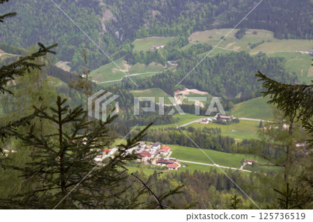 Exploring the breathtaking landscapes of Kufstein in Tyrol, where lush green valleys meet charming villages nestled amid majestic mountains Exploring the breathtaking landscapes of Kufstein in Tyrol, where lush green valleys meet charming villages nestled amid majestic mountains 125736519