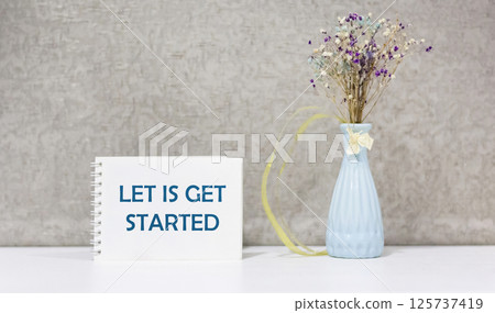 LET'S START writing the concept of the text in a notebook on a beautiful background LET'S START writing the concept of the text in a notebook on a beautiful background 125737419