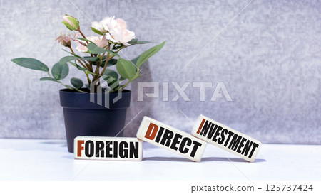 The concept of foreign direct investment with the text Foreign Direct Investment ,FDI  125737424