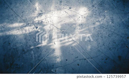 Retro modern background texture with light hitting a concrete wall 125739957