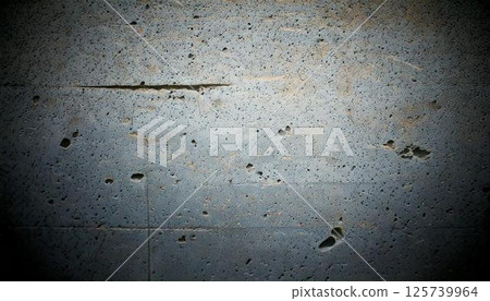 Retro modern background texture with light hitting a concrete wall 125739964